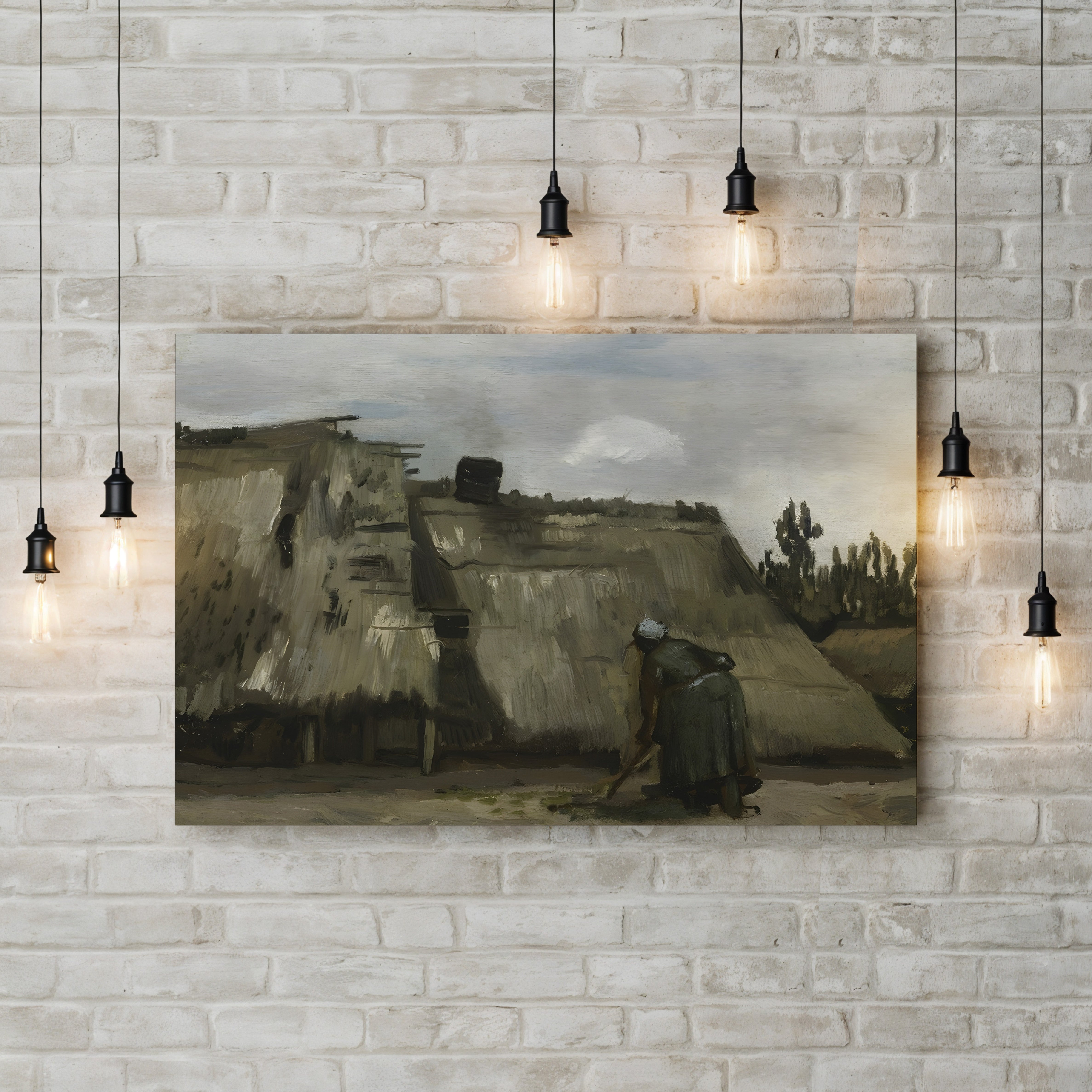 A Peasant Woman Digging in Front of Her Cottage by Vincent van Gogh canvas print displayed in a living room with wall lighting