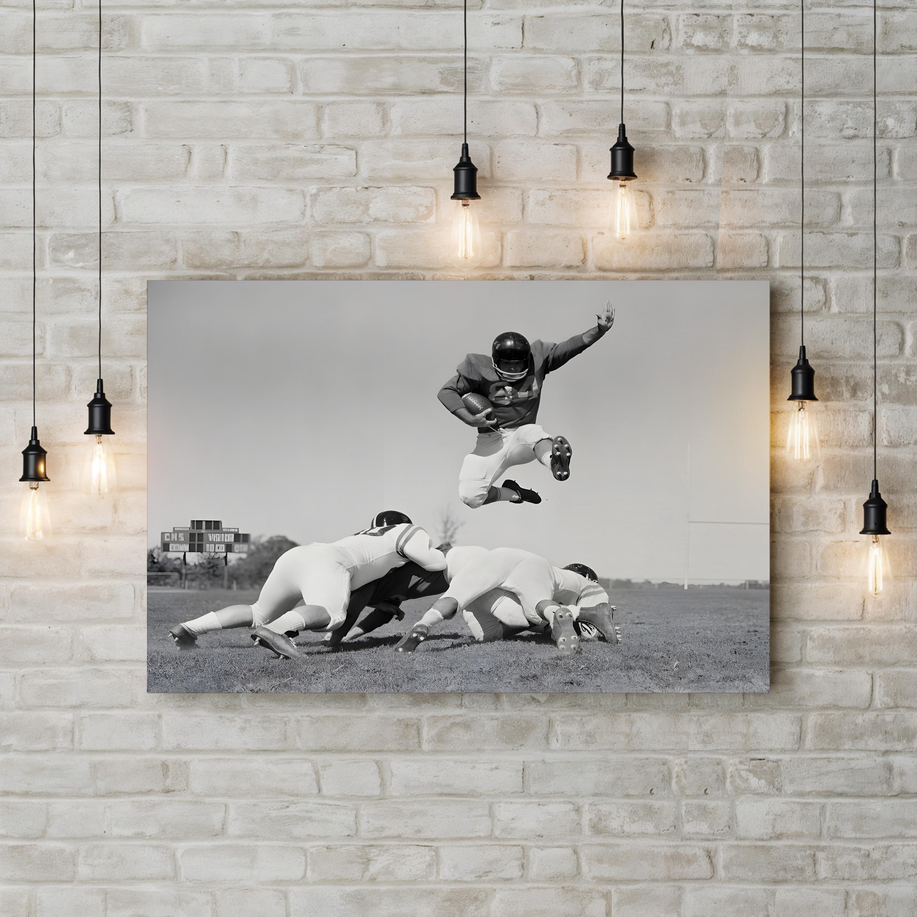 1960s Football Action Leap – Vintage Photography Wall Art | Black & White Sports Canvas Print