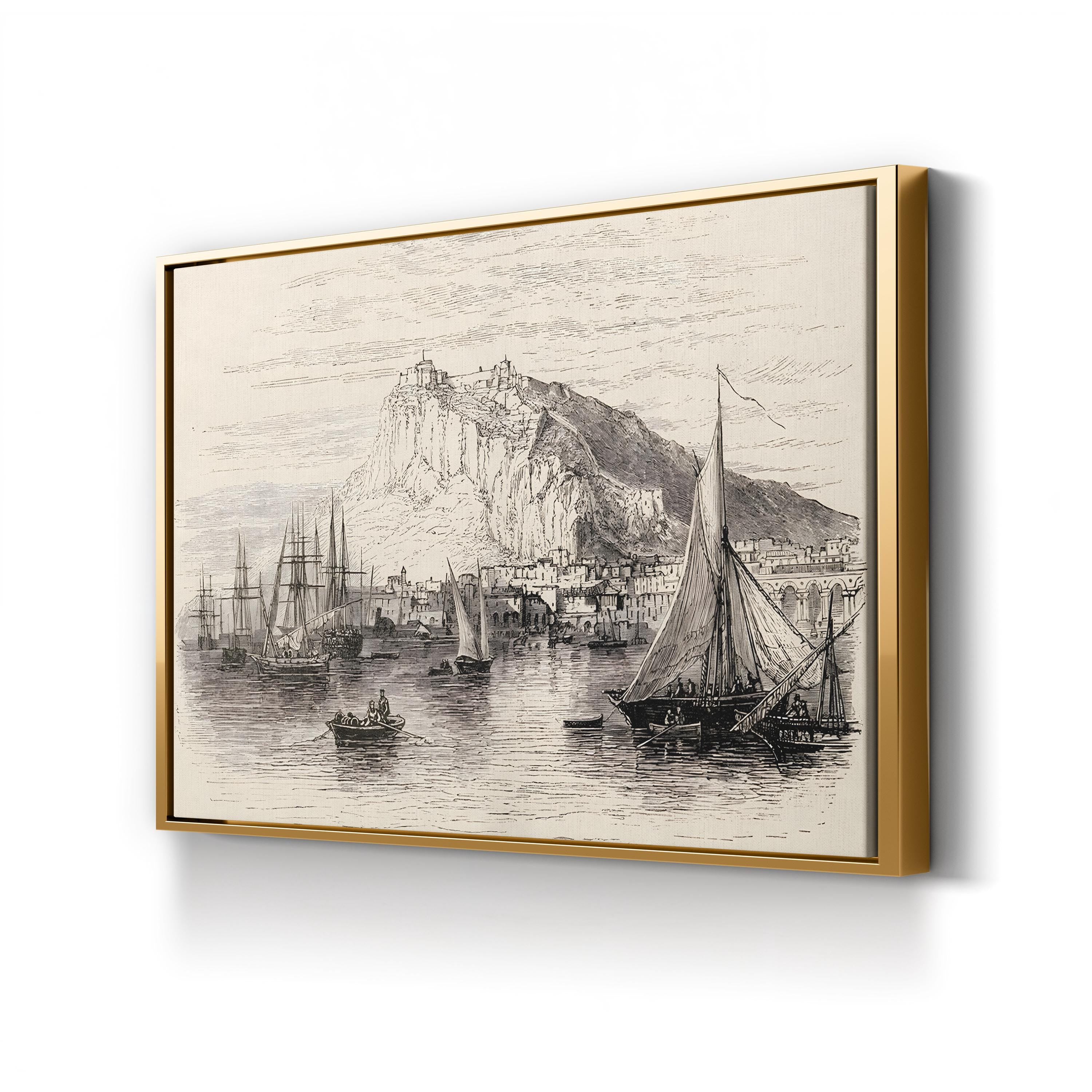Framed black and white print of a coastal scene with boats and a mountain.