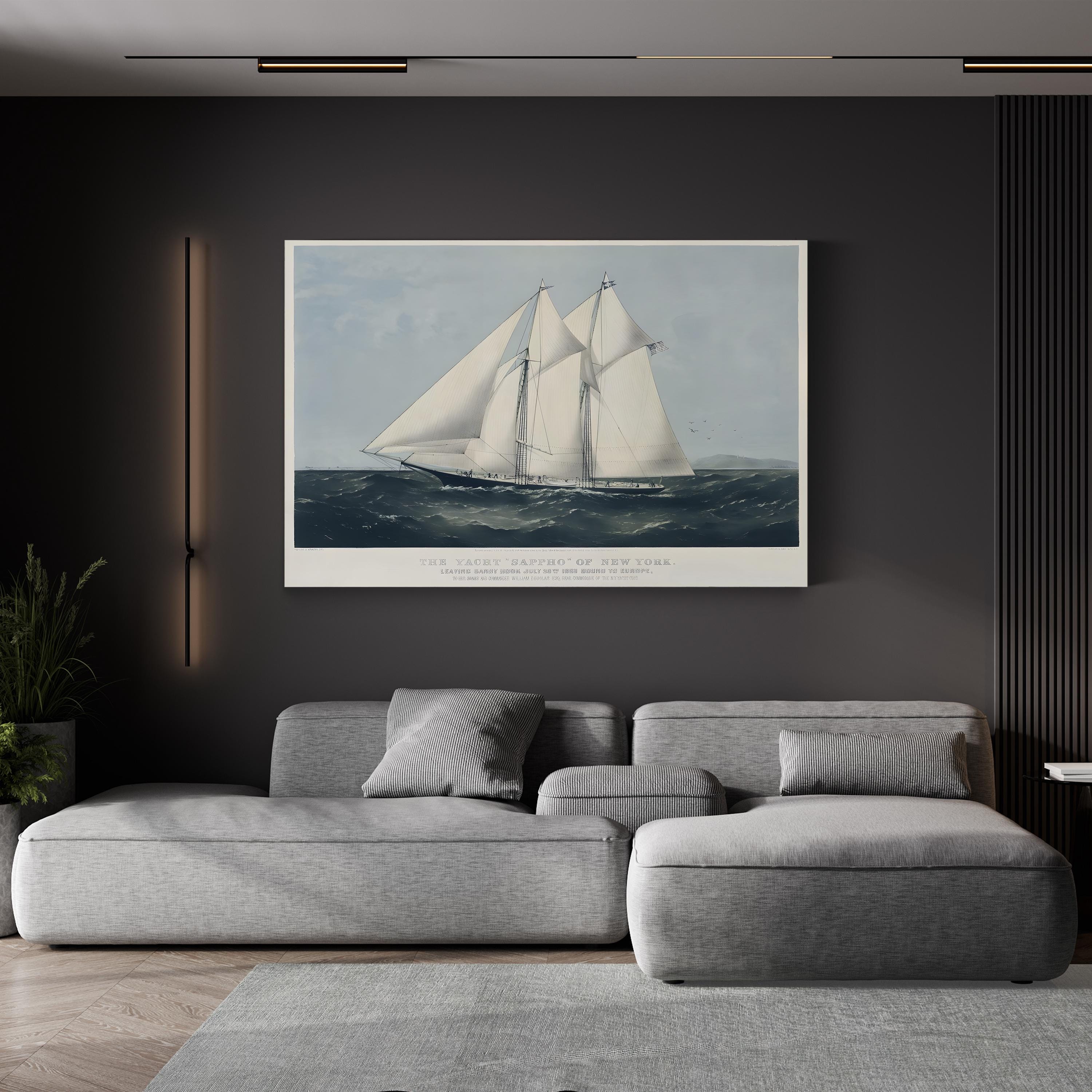 Gray sectional sofa in a living room with a large framed ship painting on the wall.