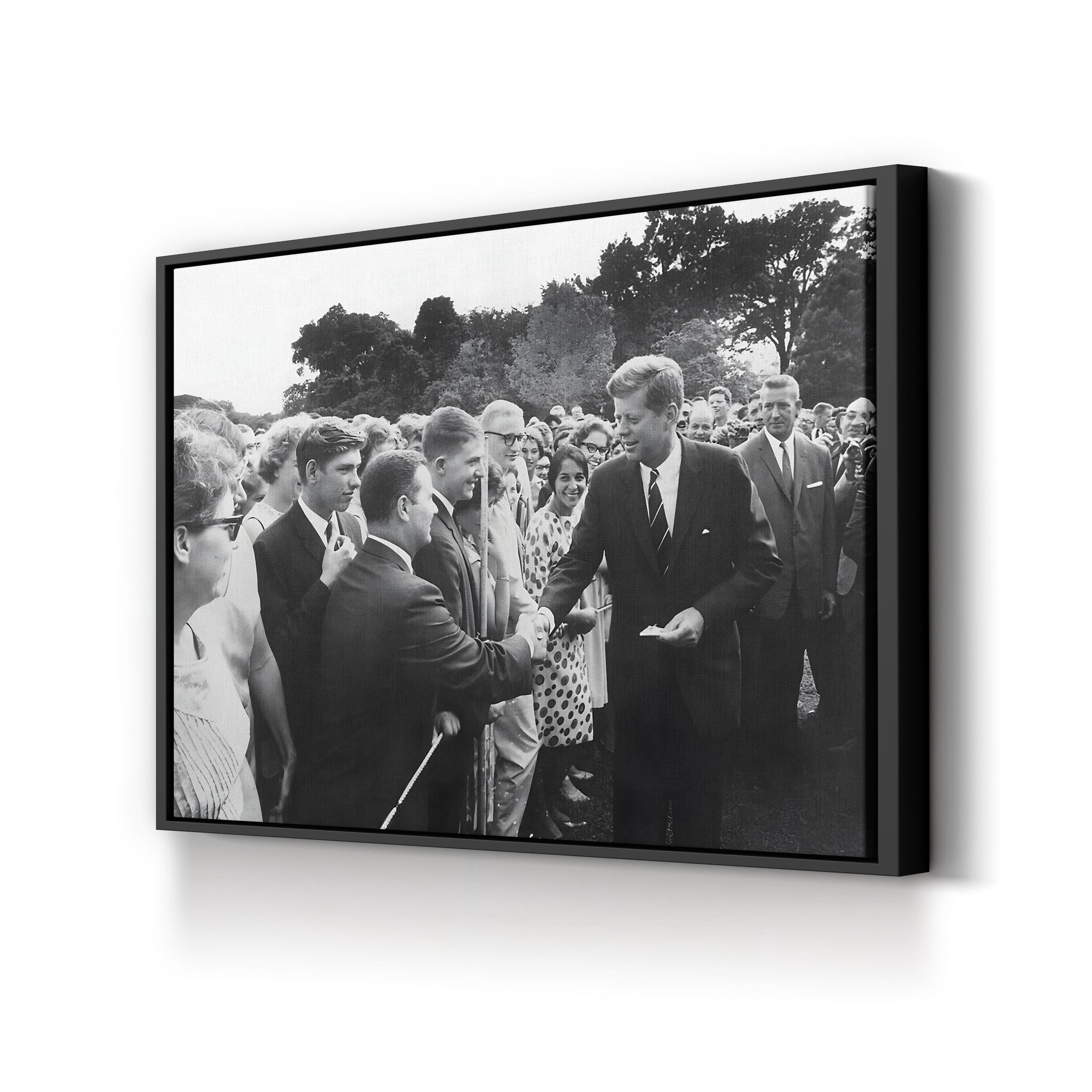 President Kennedy Greets Peace Corps Volunteers, c. 1962, by Abbie Rowe canvas print in a black frame