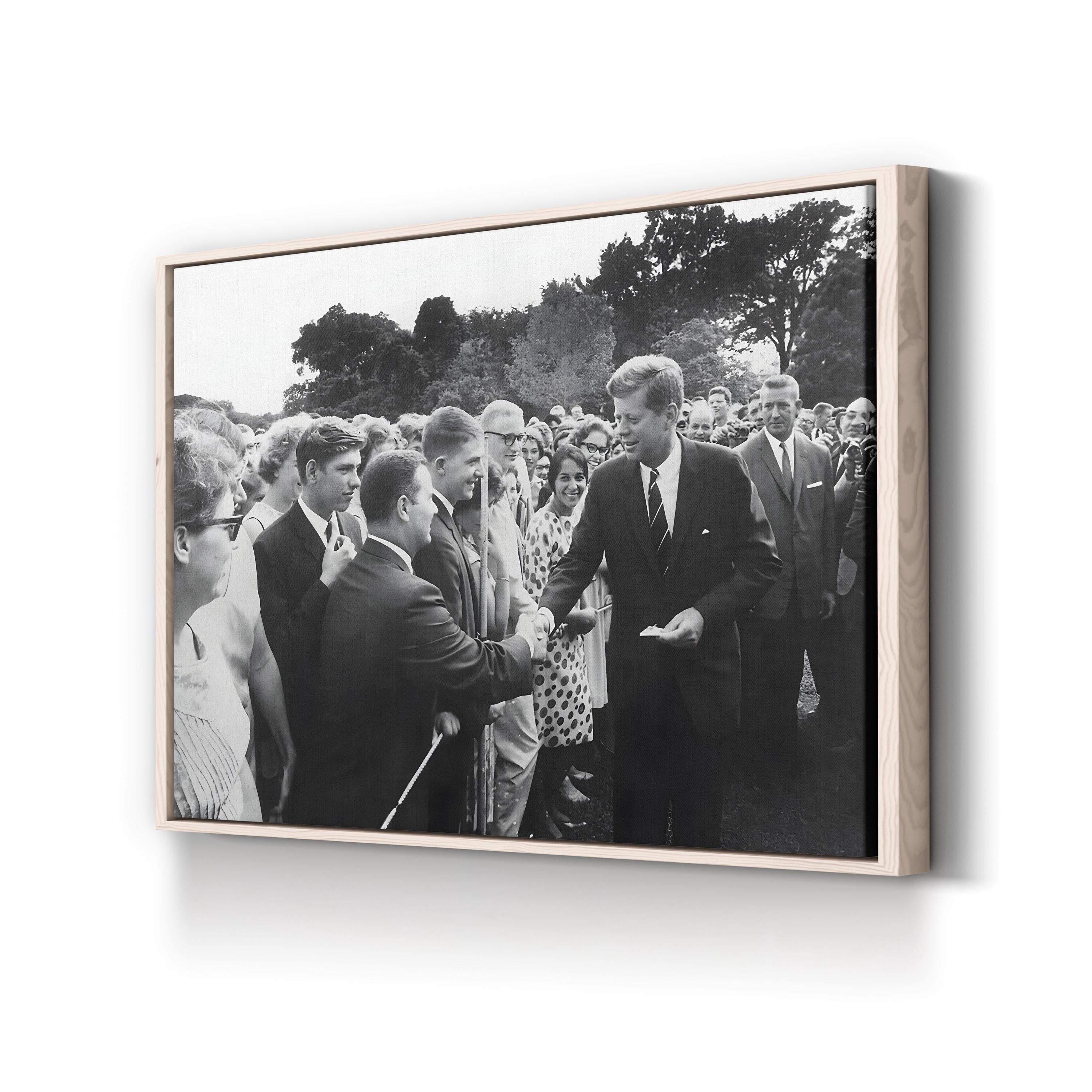 President Kennedy Greets Peace Corps Volunteers, c. 1962, by Abbie Rowe canvas print in a natural wood frame