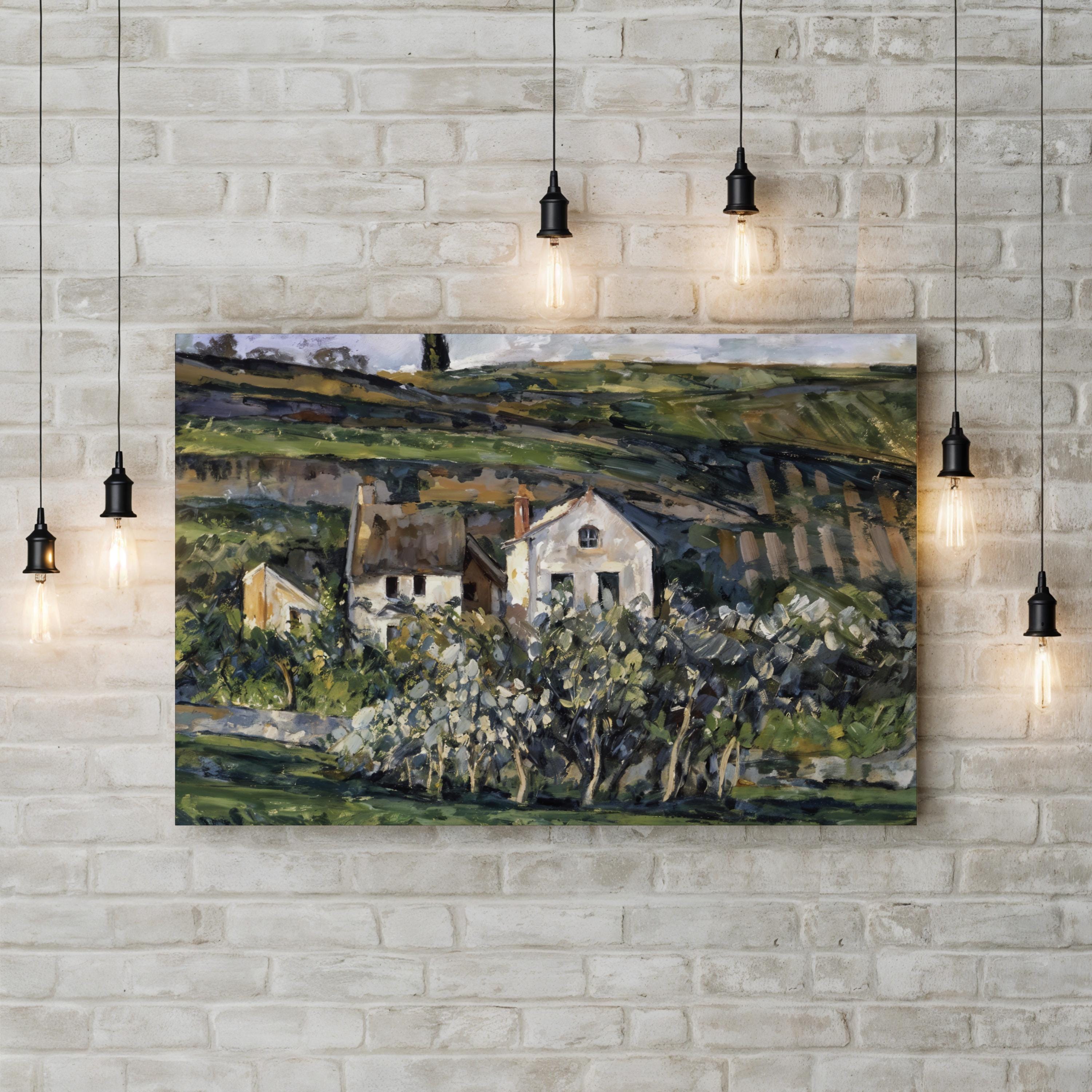 Painting of a landscape with modest village houses nestled within the rural landscape of Auvers on a brick wall with pendant lights.
