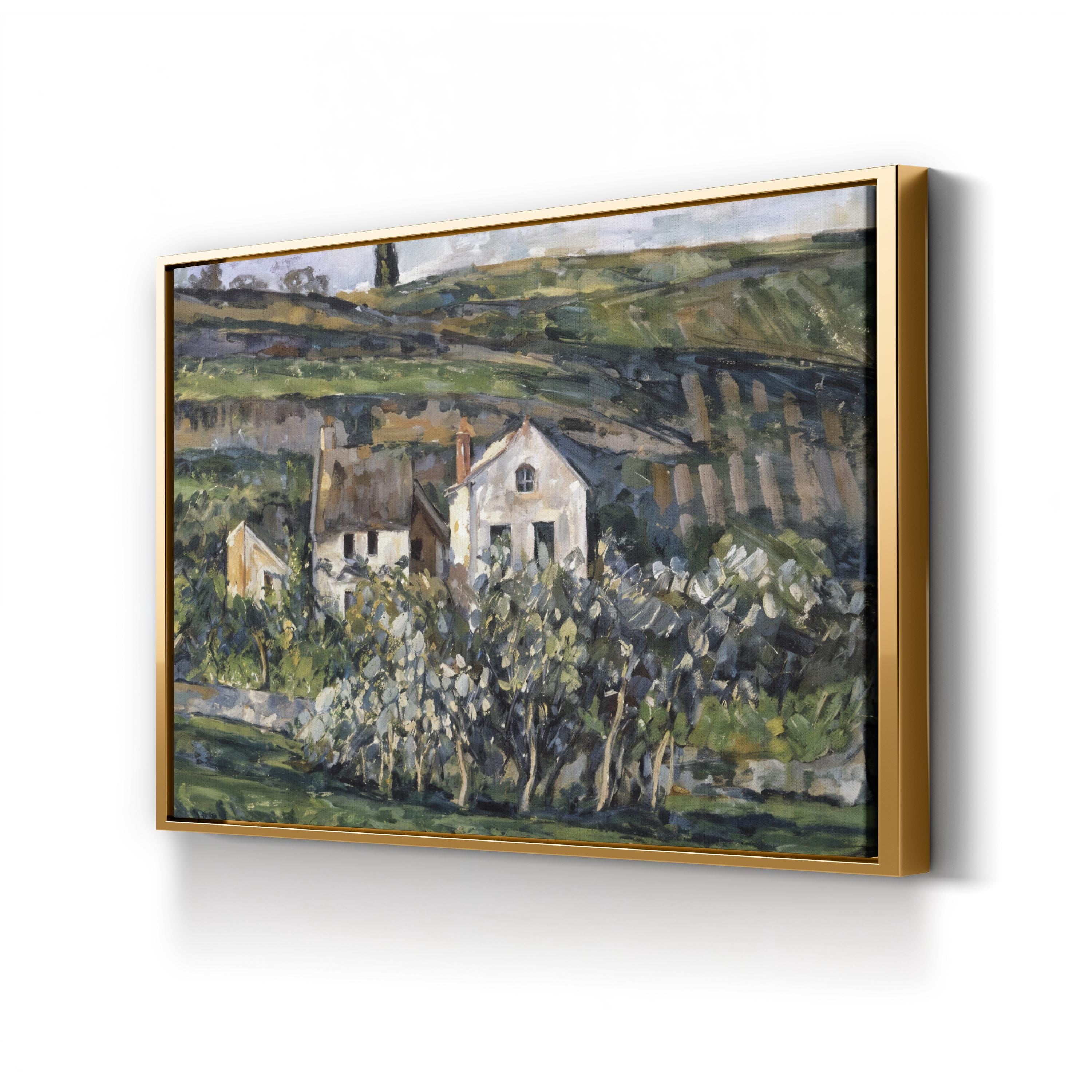 Framed painting of a landscape with modest village houses nestled within the rural landscape of Auvers and trees on a white wall