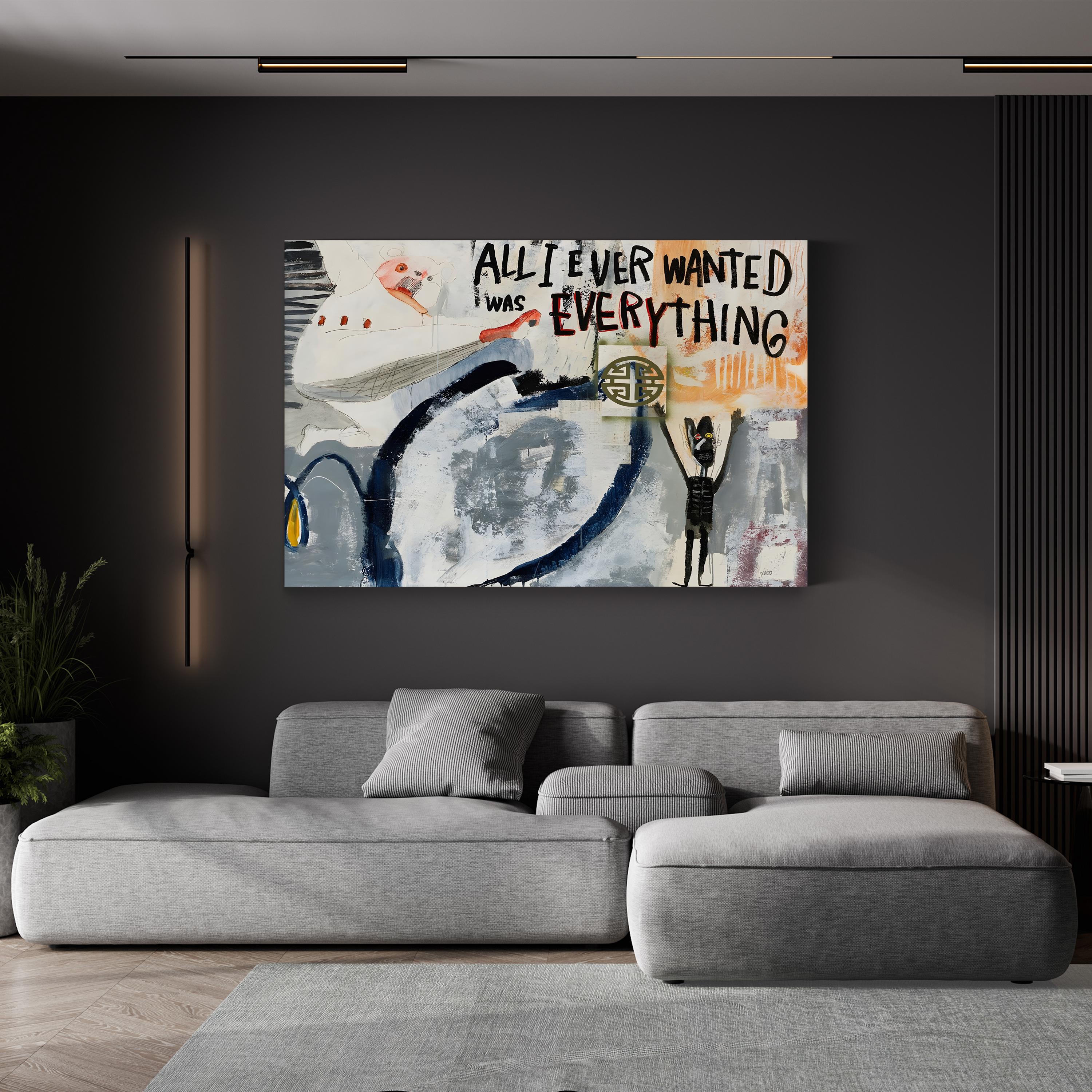 Gray sofa in a modern living room with a colorful abstract painting on the wall.