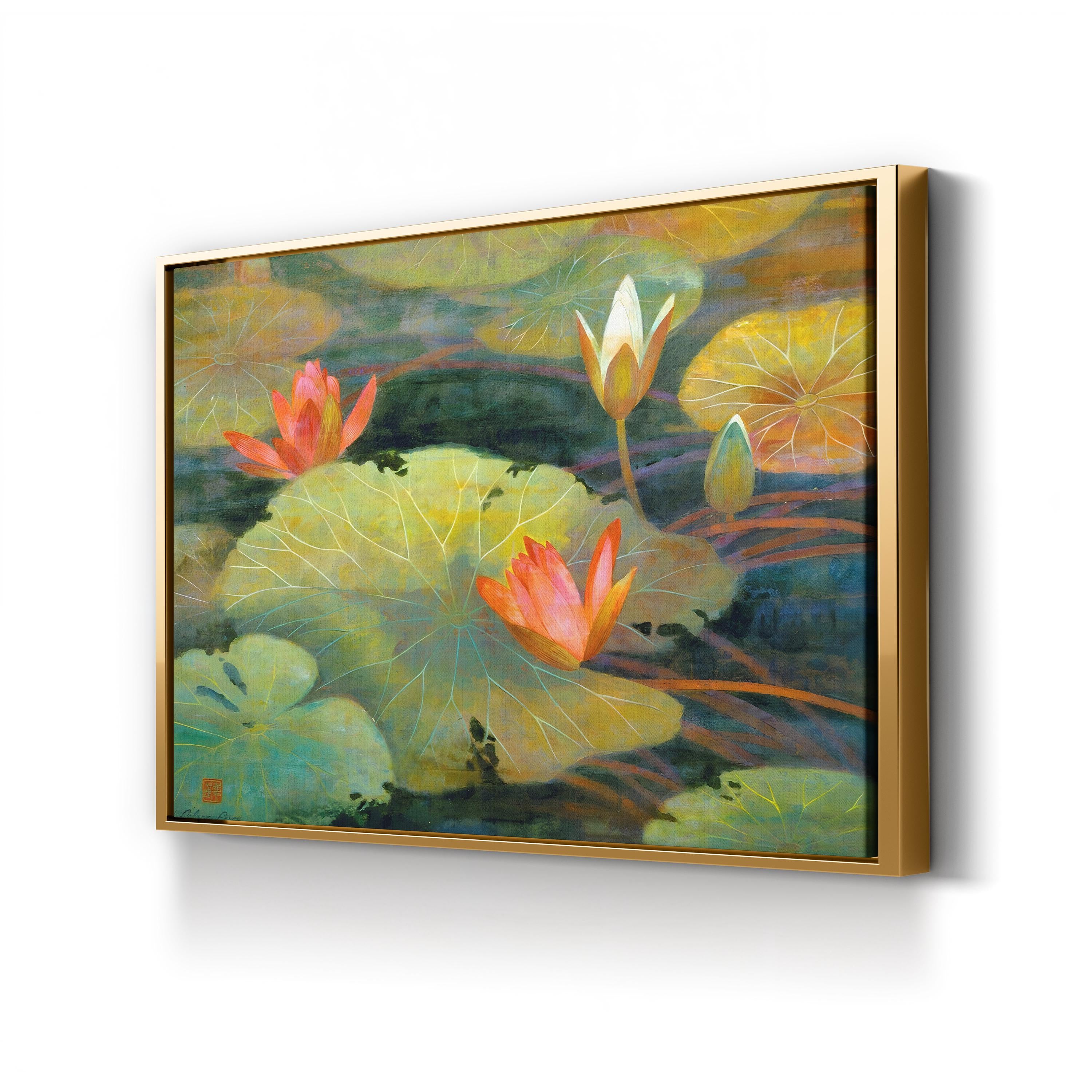 Framed painting of water lilies on a white wall