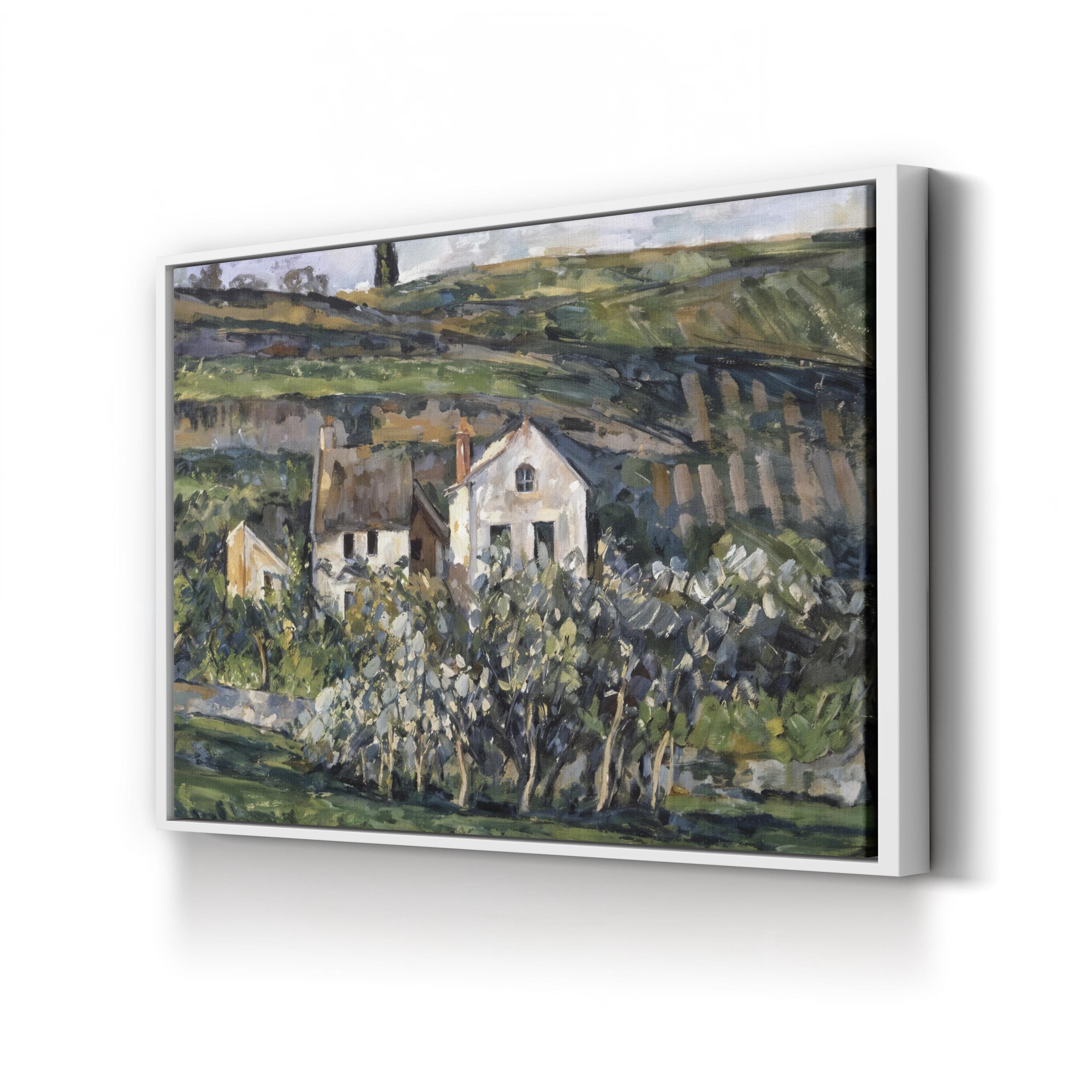 Framed painting of a landscape with houses and trees on a white background