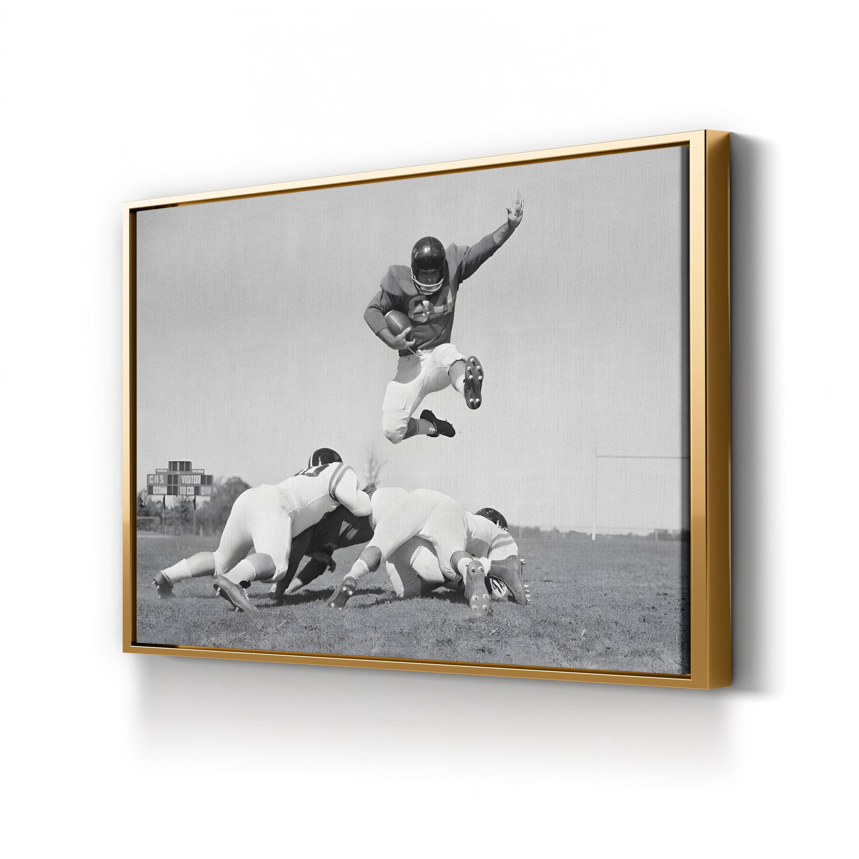 1960s Football Action Leap – Vintage Photography Wall Art | Black & White Sports Canvas Print