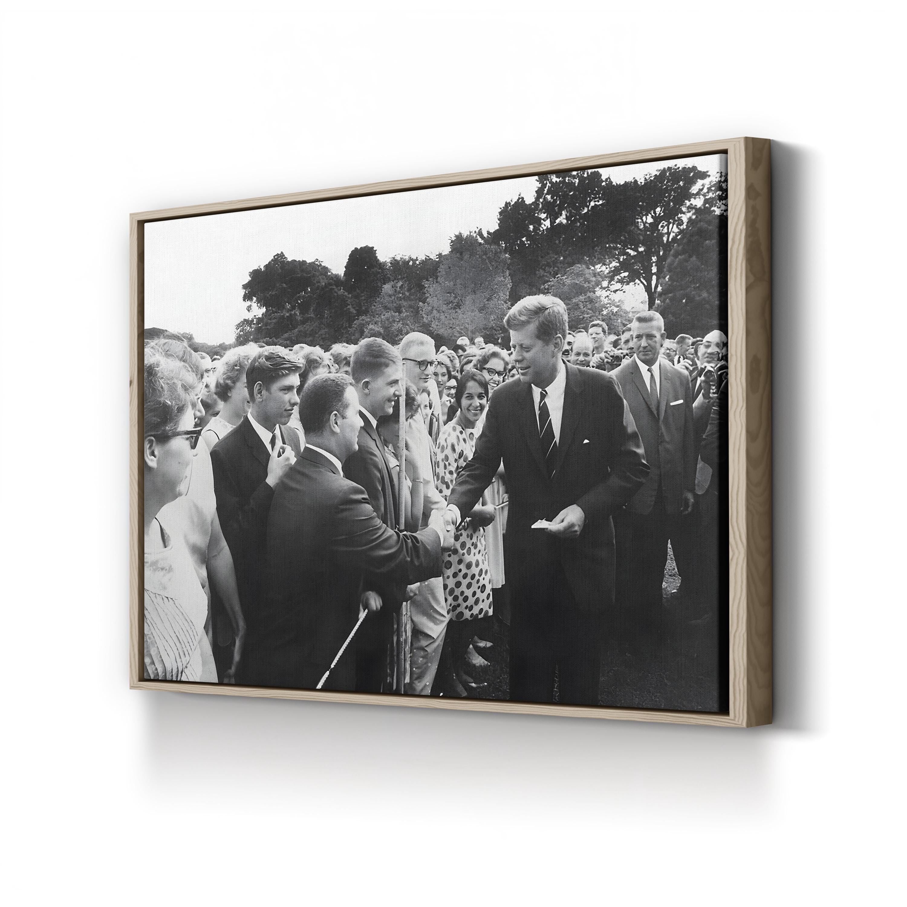 President Kennedy Greets Peace Corps Volunteers, c. 1962, by Abbie Rowe canvas print in an oak frame