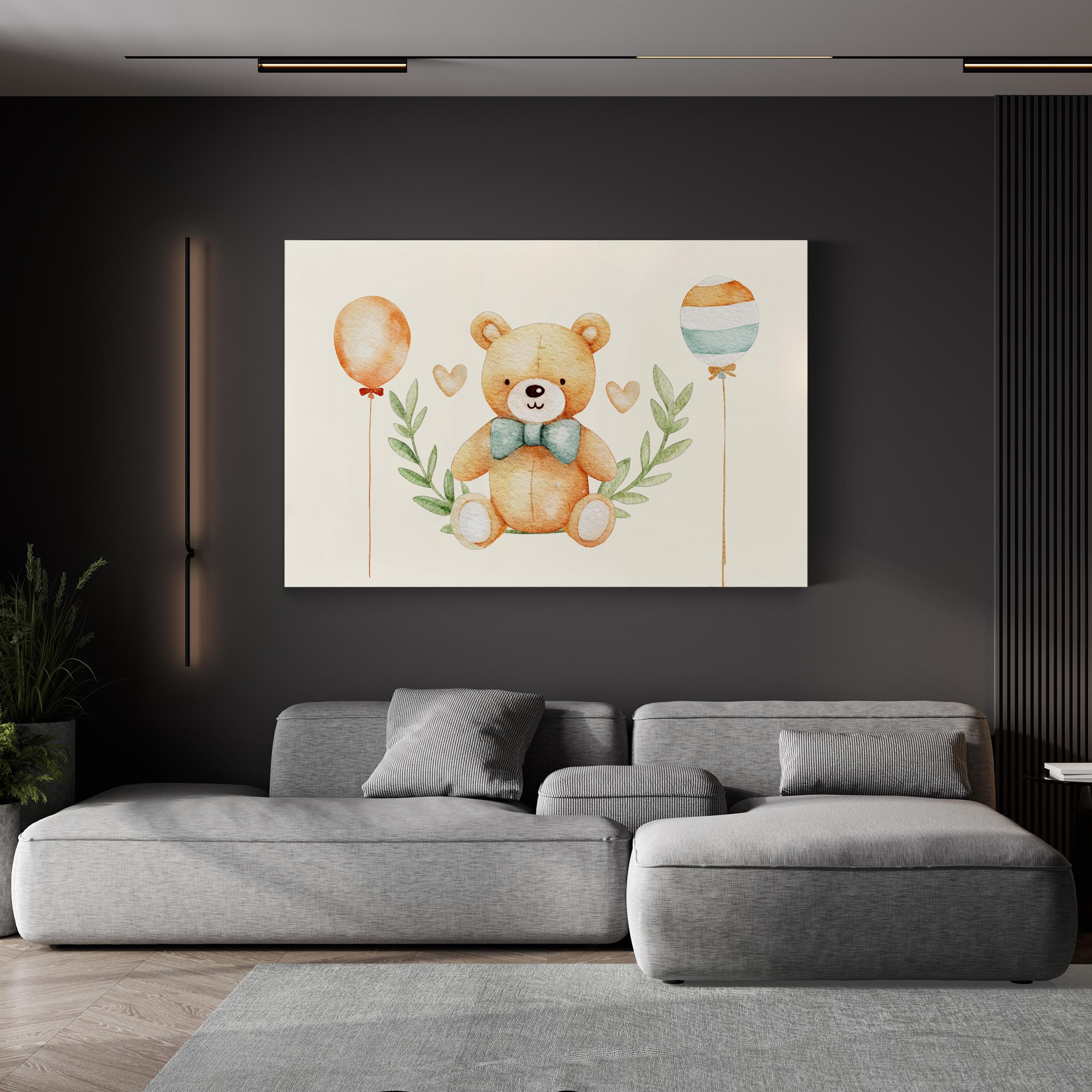 Gray sofa in a living room with a teddy bear painting on the wall.