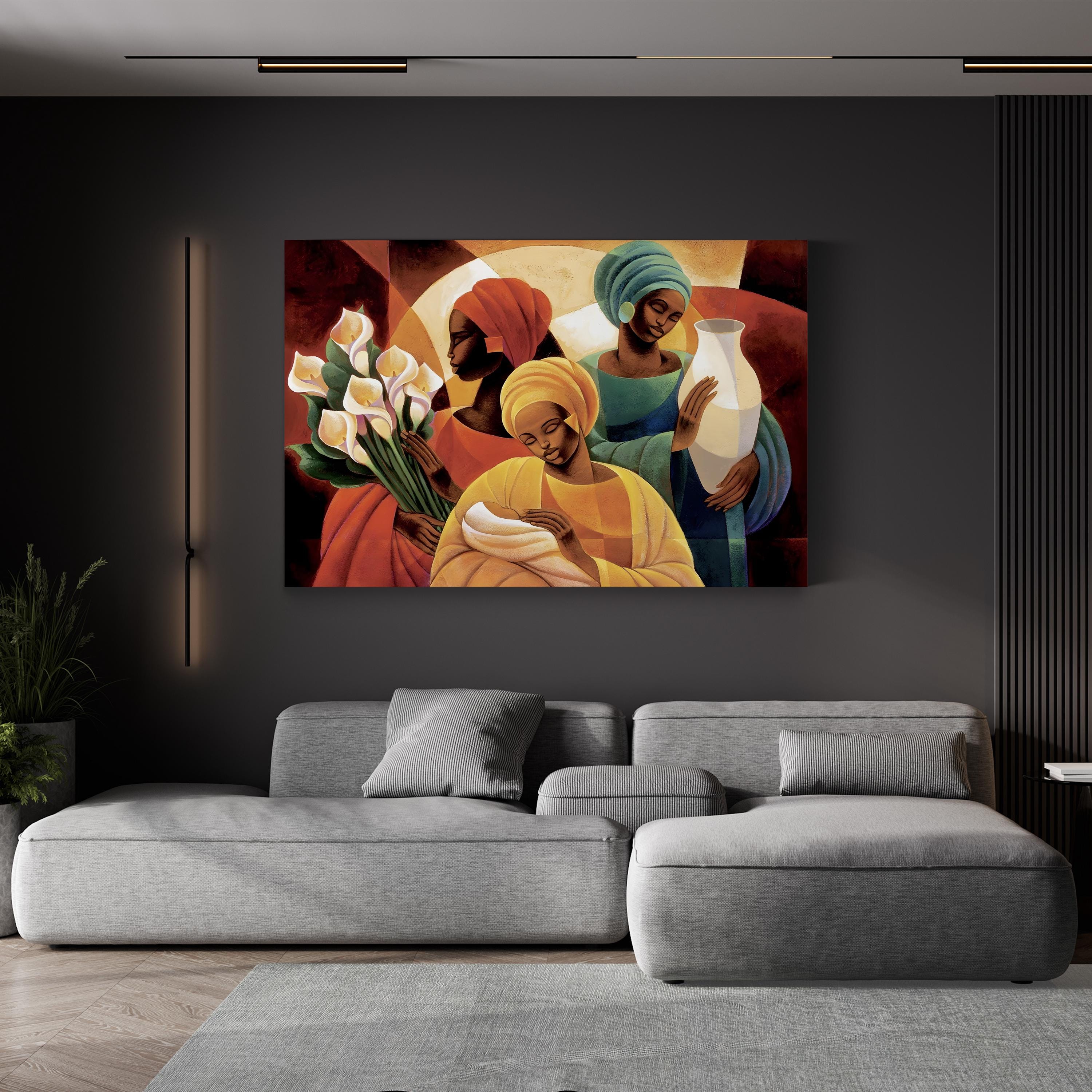 Gray sectional sofa in a living room with a colorful painting of three people and flowers on the wall.