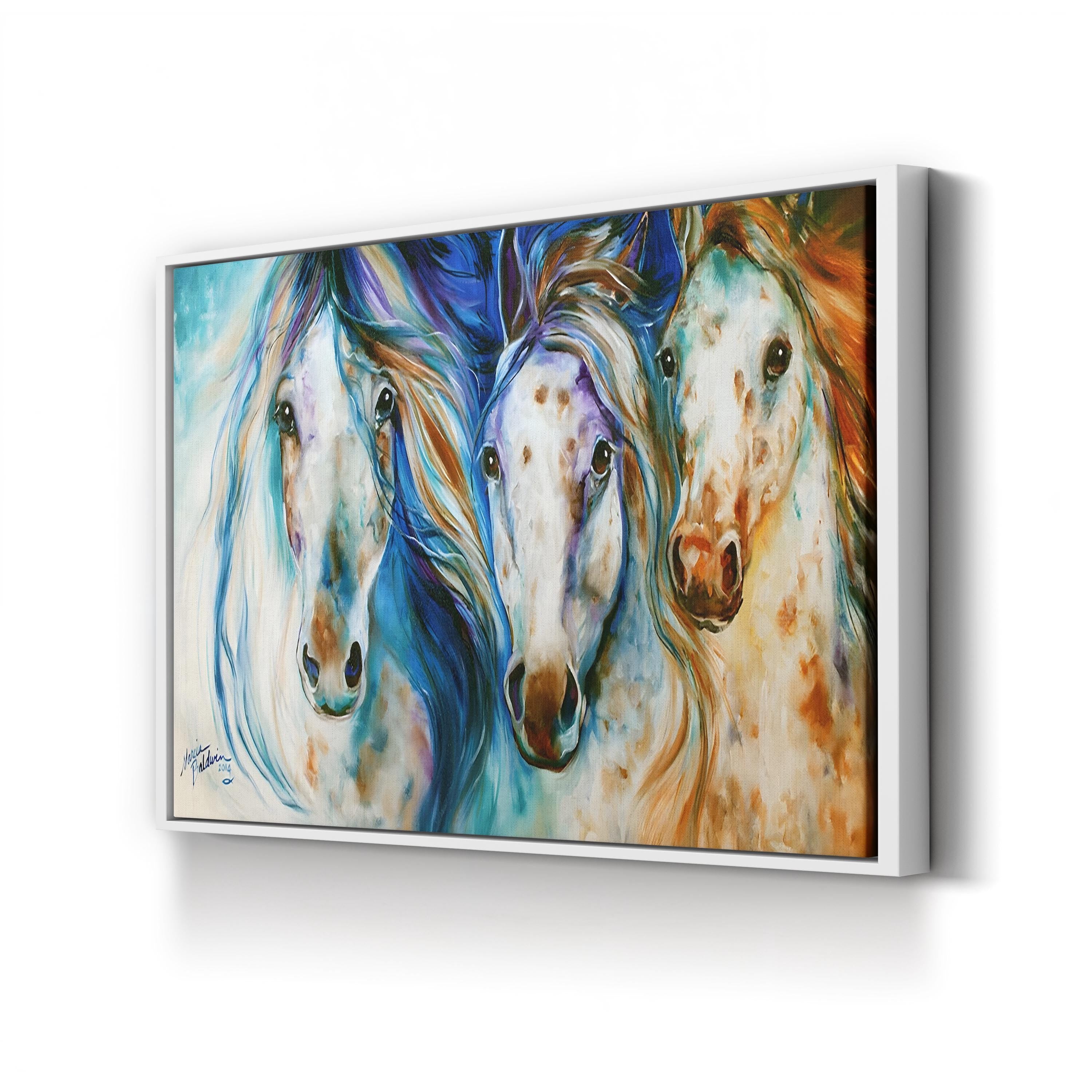 Framed artwork of three colorful horses on a white background