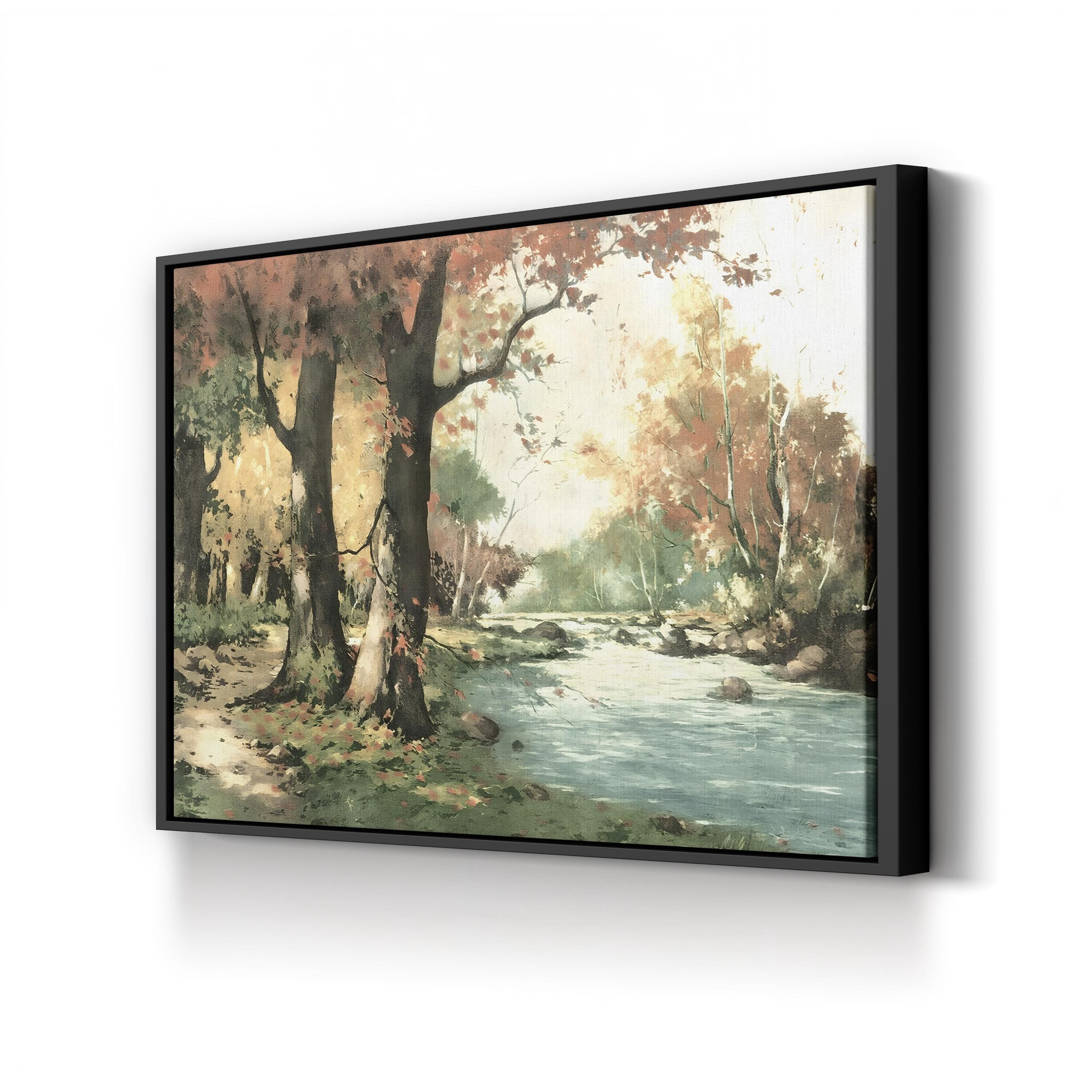 Framed painting of a forest scene with a stream on a white wall