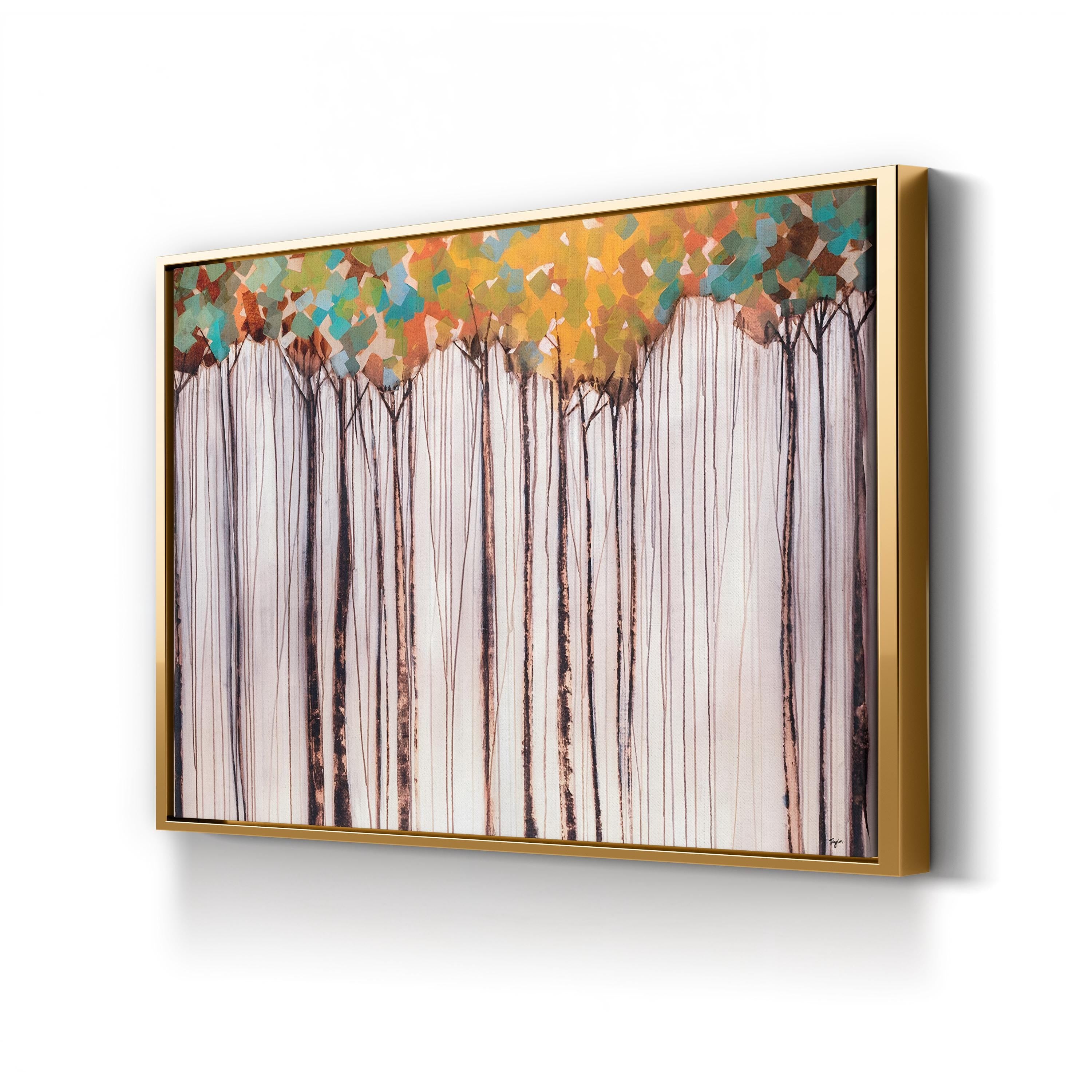 Framed artwork of trees with colorful foliage on a white wall
